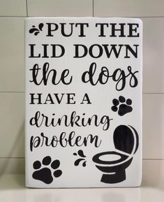 Put The Lid Down the Dogs Have a Drinking Problem, funny Hand painted wooden sign bathroom decor. Approximate size 5.5 inch x 8 inch x 1 inch solid pine. Sign is a shelf sitter. No hanging hardware is attached. Each sign is hand sanded to be smooth with smooth edges. Each product will vary slightly, as wood is a natural material that has natural appearance and differences  (grains, knots and slight imperfections) and each one is hand painted for you - that's what makes it unique! Signs are made to order, painted and/or stained and intended for indoor use. Please message me with questions.   Thanks for looking. Pine Shelf, Funny Dog Signs, Pine Shelves, Hand Painted Wooden Signs, Funny Pets, Pets Funny, Dog Signs, Smooth Edges, Bathroom Signs