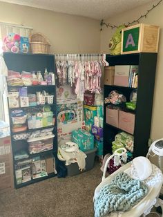 a room filled with lots of baby items