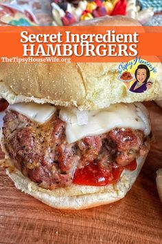 The photo shows a delicious burger with a secret ingredient found in the recipe. The brightly colored banner displays the name of the recipe, "secret ingredient hamburgers." Housewife Recipes, Hamburger Toppings, Tipsy Housewife, Best Burger Recipe, Burger Toppings, Hamburger Recipes, Beef Burgers, Delicious Burgers, Football Food