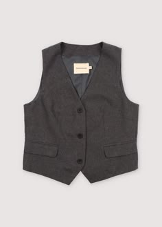 Upgrade your look with our tailored waistcoat, boasting two flap pockets and a front closure adorned with black buttons. This versatile piece is the perfect complement to our matching trousers, creating a polished ensemble that seamlessly blends style and sophistication. 100% cotton / lining: 100% polyester. Cheap Striped Women's Vest, Affordable Fitted Zara Vest, Cheap Casual Gray Vest, Cheap Classic Solid Color Vest, Cheap Black Vest For Spring, Cheap Fitted Gray Vest, Cheap Chic Black Vest, Affordable Zara Women's Vest, Luxury Gray Sleeveless Vest