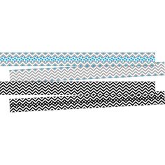 three strips of black and white chevroned paper with blue dots on each strip