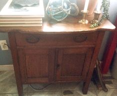 a wooden table with candles on top of it