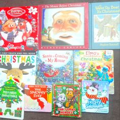 there are many children's christmas books on the table with each one being read