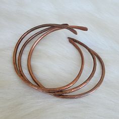 Set Of 3 Handmade Copper Bangles , Hammered For A Textured Look With A Slight Patina (Oxidation) For A Slightly Distressed Look . Made Of 99% Pure Copper, Adjustable Fit For A Small To Med Sized Wrist. Copper Bracelets Handmade, Handmade Copper Bangle In Brown, Bronze Copper Bracelet With Patina, Unique Gold-colored Copper Bangle, Nickel-free Bohemian Copper Bracelets, 100% Copper Braclet, Precious Stones Bracelet, Juicy Couture Charms Bracelet, Peridot Birthstone