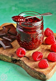 raspberry and chocolate jam on a cutting board