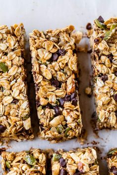 granola bars are lined up on a baking sheet