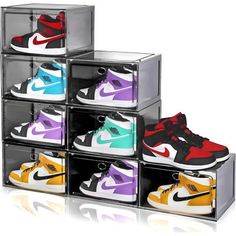 six clear boxes with different colored shoes in them