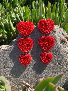 Handmade red Statement beaded earrings. Red Beaded Dangle Jewelry, Red Beaded Drop Earrings As Gift, Handmade Drop Earrings For Valentine's Day, Red Drop Beaded Earrings As Gift, Handmade Red Beaded Earrings, Gift Heart Beads Drop Earrings, Beaded Heart Drop Earrings As Gift, Valentine's Day Gift Beaded Earrings With Round Beads, Beaded Heart Drop Earrings For Gifts