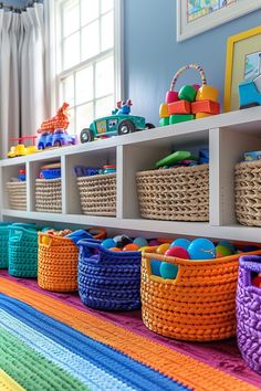 colorful baskets and toys are lined up on the floor in this child's playroom