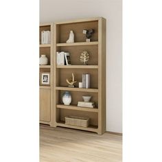 a wooden bookcase with many books on it