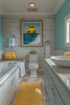 a bathroom with blue walls and white fixtures