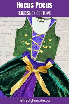 the princess costume is made with green and purple velvet