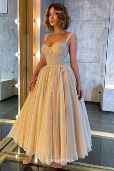 Description:1.Fabric: Glitter Tulle2.It can be made in other colors and custom size,please contact us.If dress is custom made, we need to size as following(If you aren't sure how to get it,here is our)bust:______ cm/inch waist:______cm/inch hip:_______cm/inch hollow to floor with bare foot:_______cm/inch extra heels:_______cm/inch shoulder to shoulder :_______cm/inch (measured from back of shoulder) shoulder to bust :_______cm/inch (measured from middle shoulder to nipple) shoulder to waist :_______cm/inch (measured from middle of shoulder to natural waist) nipple to nipple:_______cm/inch armhole:______ cm/inchTips: Color may vary between different fabrics. Make sure you order swatches and check color charts firstly if you aren't sure that is what you want.Please be aware that slight color Extra Heels, Sparkly Prom Dresses, Fabric Glitter, Color Charts, Different Fabrics, Ankle Length, Shoulder To Shoulder, Custom Color, A Line