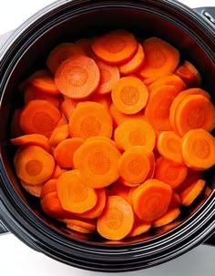 the carrots are in the crock pot ready to be cooked