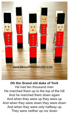 some wooden toy soldiers are lined up in the shape of britain's royal guard