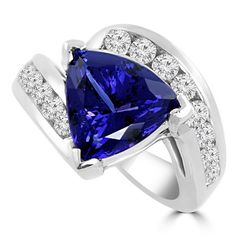 a ring with a blue heart shaped stone surrounded by white cubicnes and diamonds on the sides