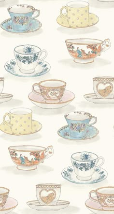 many cups and saucers are lined up together