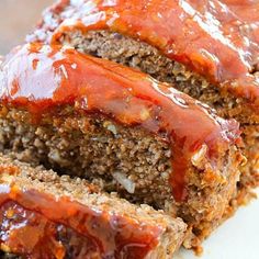 meatloaf covered in ketchup on top of bread