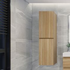 a bathroom with a sink, mirror and wooden cabinet