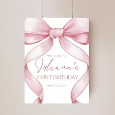 a pink birthday card with a ribbon on it