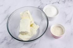 butter and other ingredients in bowls on a marble counter