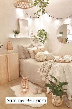 a bedroom with white walls and wooden flooring, plants in baskets on the bed