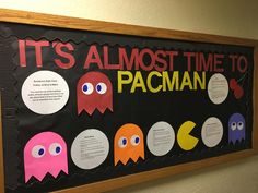 a bulletin board with pacman faces on it's almost time to pacman