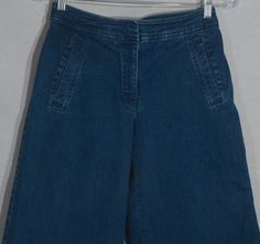 You'll love wearing these hip, on-trend vintage culotte jeans! These are late 1990's flared, wide leg capri jeans with the high end Westbound petites label. Something you'll really like about this denim culottes is how the stretchy dark blue wash, medium weight jean material has a flattering A Line shape and cut that will look great on your figure. These culottes have a vintage look and feel that's really popular again and you'll really like having this pair to mix and match with your favorite t Vintage Cropped Leg Pants For Spring, Vintage Dark Wash Bottoms For Spring, Vintage Cropped Leg Denim Blue Bottoms, Vintage Cropped Leg Summer Bottoms, Vintage Cropped Leg Bottoms For Summer, Vintage Cropped Leg Bottoms, 90s Style Dark Wash Spring Pants, 90s Style Dark Wash Bottoms For Spring, Vintage Capri