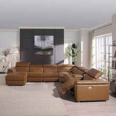 a modern living room with leather furniture and white carpeted flooring is pictured in this image