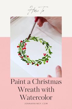 someone is painting a christmas wreath with watercolors on paper and the words paint a christmas wreath with watercolor