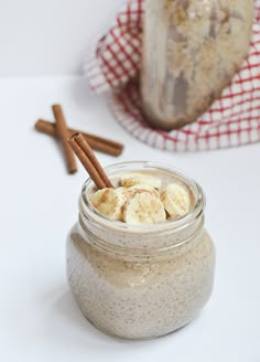 a glass jar filled with banana slices and cinnamon