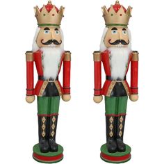 two wooden nutcrackers with crowns on their heads, one is green and the other is red