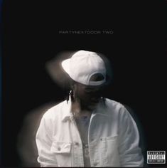 a man wearing a white hat and jacket standing in front of a black background with the words partyxdvdor two on it