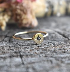 Gold North Star Ring: - 18k Gold Vermeil -1.2mm width band -6mm Round Circle with 2mm Black Swarovski Crystal -US sizes 5-8.5 with half sizes Other Gold Rings: https://www.etsy.com/shop/AWildViolet?ref=seller-platform-mcnav&section_id=43531875 Connect with us on Instagram @a_wild_violet for sales and giveaways! **All items are in stock and ship within 2-5 business days from received payment (excluding Saturday/Sunday) from the US. If you are within the US please expect 3-7 business days for ship Ring Layering, North Star Ring, Compass Ring, Crystal Uses, Layered Rings, Rings Gold, Gold Ring Stack, Round Circle, Gold Gift