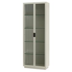 a white cabinet with glass doors on the front and bottom shelves, both closed up