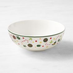 a white bowl sitting on top of a table