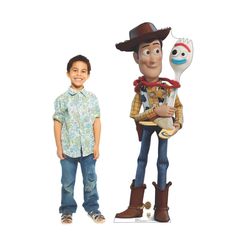 two children standing next to each other with toy characters