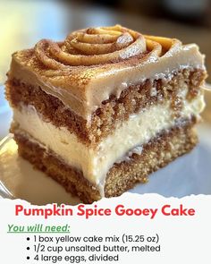 a piece of cake on a plate with the words pumpkin spice gooey cake below it