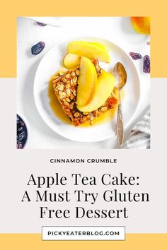 an apple tea cake on a white plate with a spoon and some fruit in it