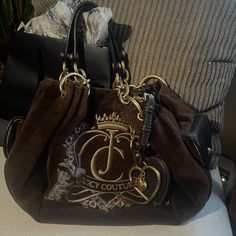 Iso Trading My Bag For A Black Vintage Bag In Similar Condition As Mine! Message Me If You Have Any Questions! Do Not Buy This Listing Unless Its For The Trade! Brown Juicy Couture, 2000s Purse, 2000s Juicy Couture, Juicy Couture Clothes, Juicy Couture Vintage, Fluffy Bag, Juicy Couture Bracelet, School Bag Essentials, Juicy Couture Purse