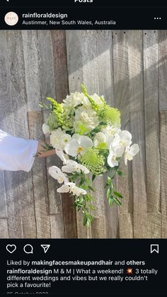 a person holding a bouquet of flowers in front of a wooden fence with the caption on it