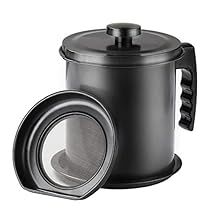 a black coffee pot with a lid and strainer in front of the container is shown