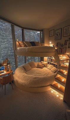 a room with two bunk beds and lights on the floor next to each other in front of a window