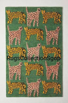 a green rug with pink and yellow cheetah on the front, black and white cheetah on the back