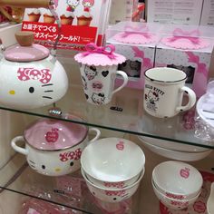 hello kitty dishes and cups are on display