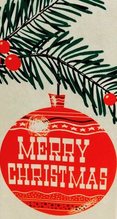 a christmas ornament hanging from a tree branch with the words merry camach written on it