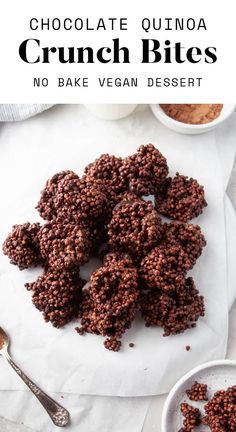 chocolate quinoa crunch bites on a white plate with spoons and bowls in the background