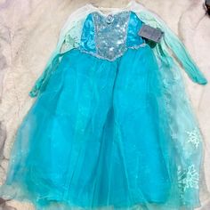 Brand New, Gorgeous, Disney, Frozen, Elsa, Princess, Dress. By The Disney Store! Gorgeous! Size 7/8 Fast Shipping Princess Style Long Sleeve Holiday Dress, Light Blue Princess Style Fancy Dress, Blue Princess Dress For Winter, Winter Princess Dress For Costume Party, Blue Long Sleeve Princess Dress For Fancy Dress, Disney Princess Dress For Dress-up, Blue Disney Dress For Costume Party, Blue Winter Princess Dress, Blue Fitted Disney Dress