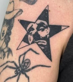 a person with a star tattoo on their arm