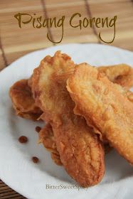 some fried food on a white plate with the words pisang goreng above it